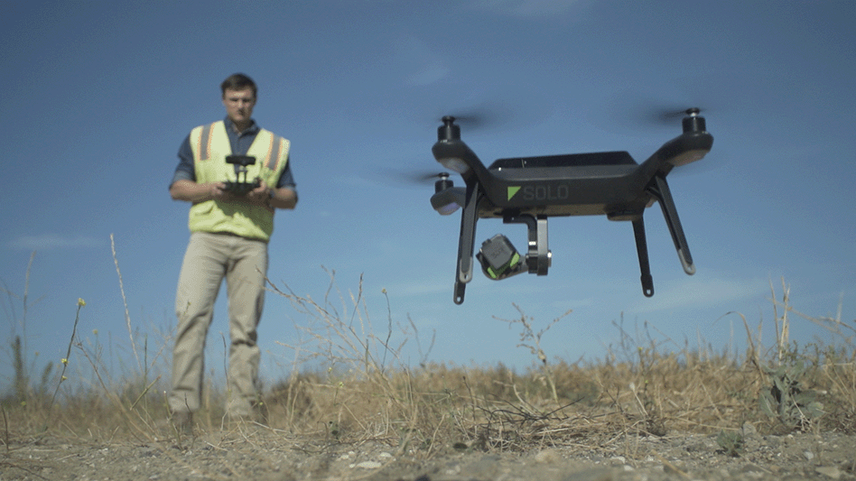 multi-rotor drone over landfill